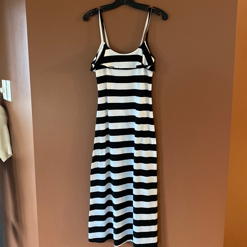 Pinc ladies beach cover-up or stretchy black and white dress. Size 10/12.
